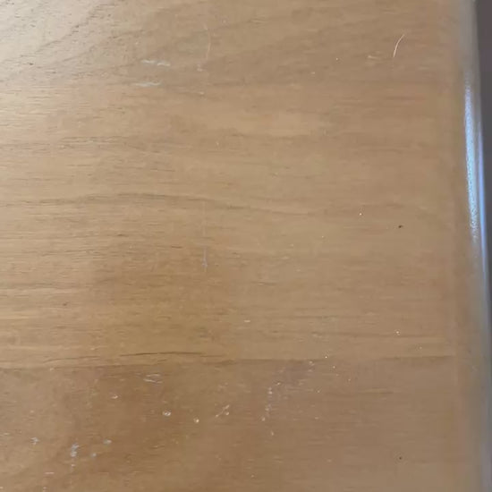 Customer video showing the before of a table that was scratched and dinged during shipping, before applying Arlington Woodworks Artisan Furniture Wood Balm.