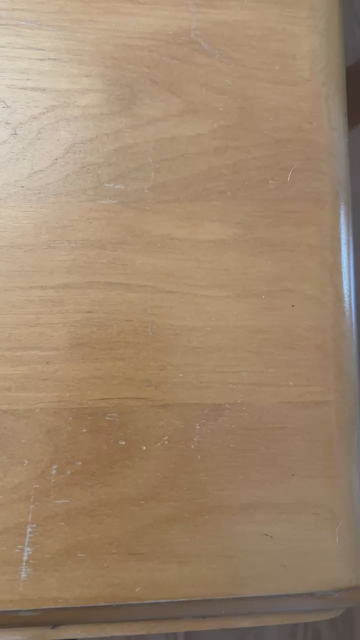 Customer video showing the before of a table that was scratched and dinged during shipping, before applying Arlington Woodworks Artisan Furniture Wood Balm.